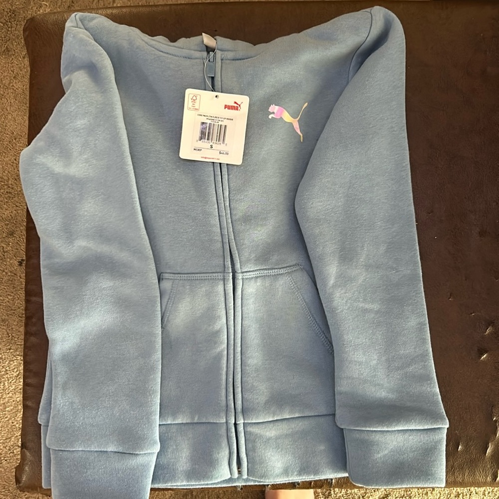 Blue puma jackets never worn.